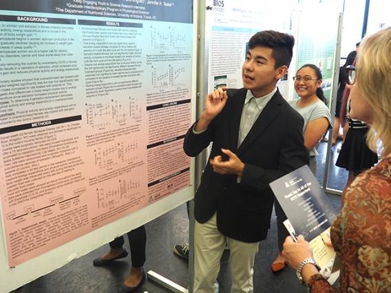 KEYS Student presenting research from poster