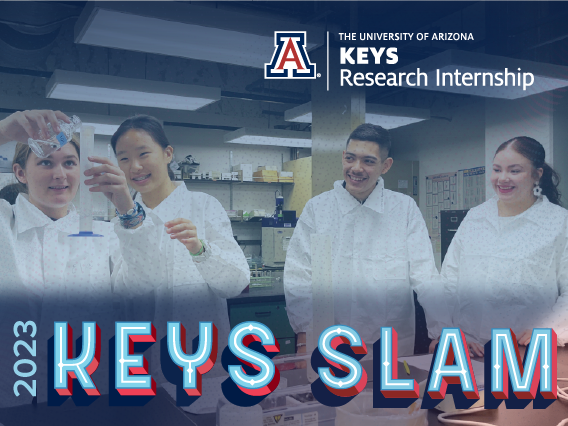 Four high school students wearing white lab coats and staring at a graduated cylinder one student is holding. They're smiling. The text at the bottom reads "2023 KEYS Slam."
