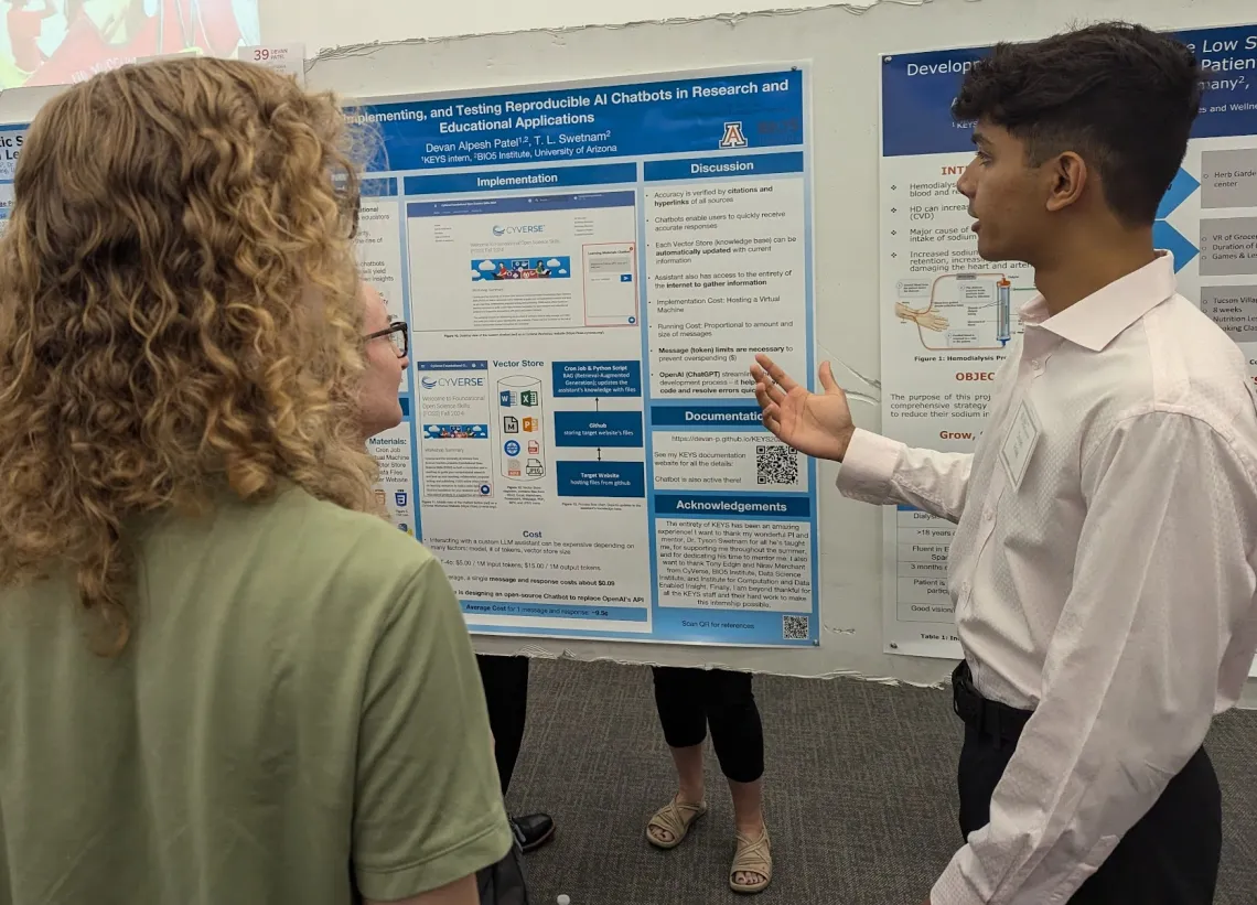 Student explaining poster