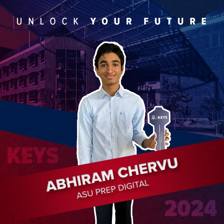 A high school student holding a paper key