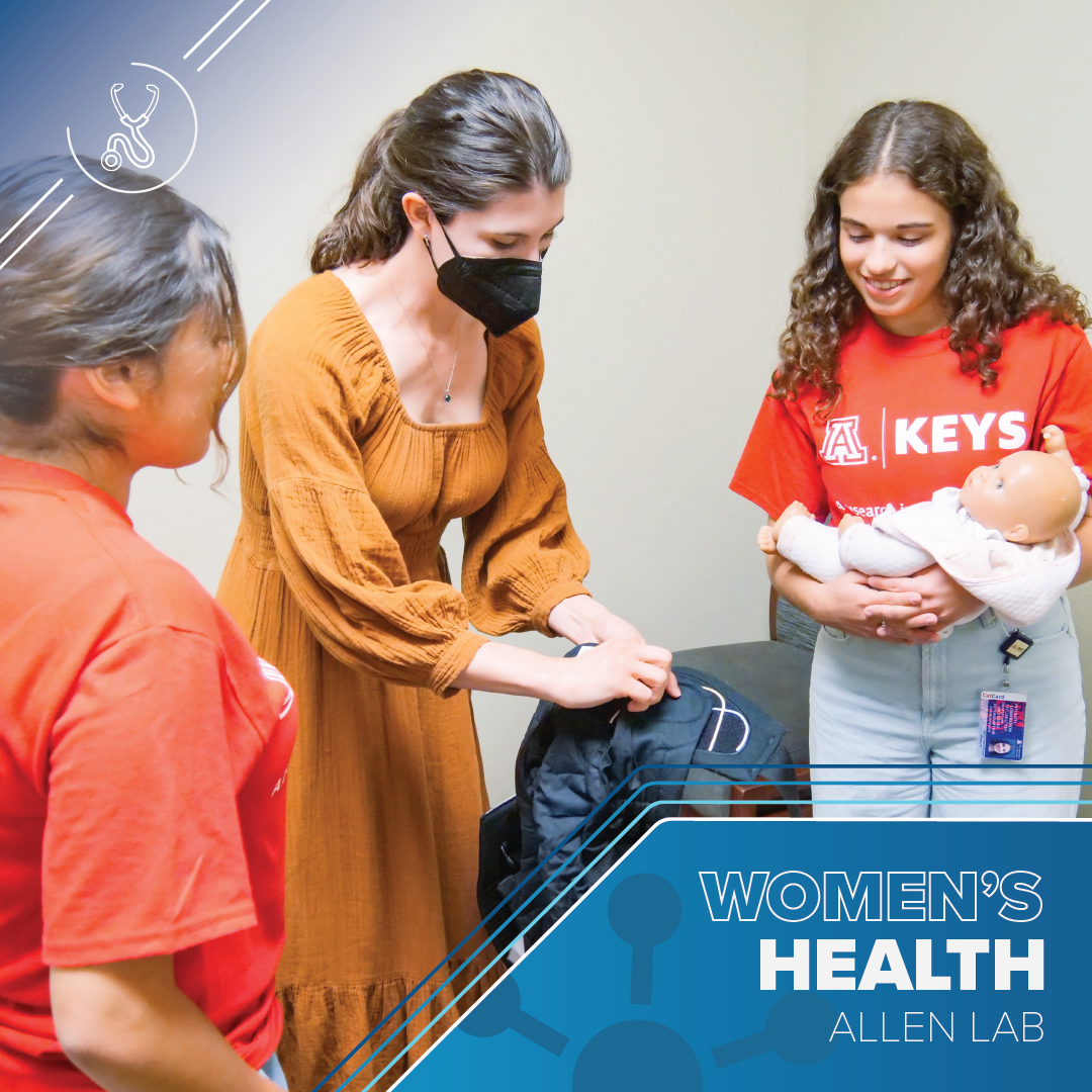 Woman in a yellow dress gets a baby carrier ready. A young woman with a red KEYS shirt smiles as she holds a baby doll. Another young woman in a red shirt looks on. Text reads Women's Health Allen Lab