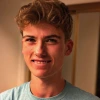 Young person with short hair